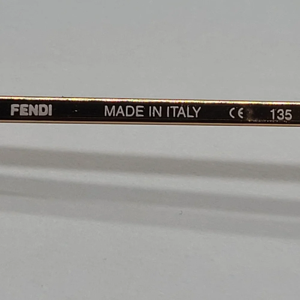 Fendi Pink Lens Rimless Sunglasses with Gold Frame